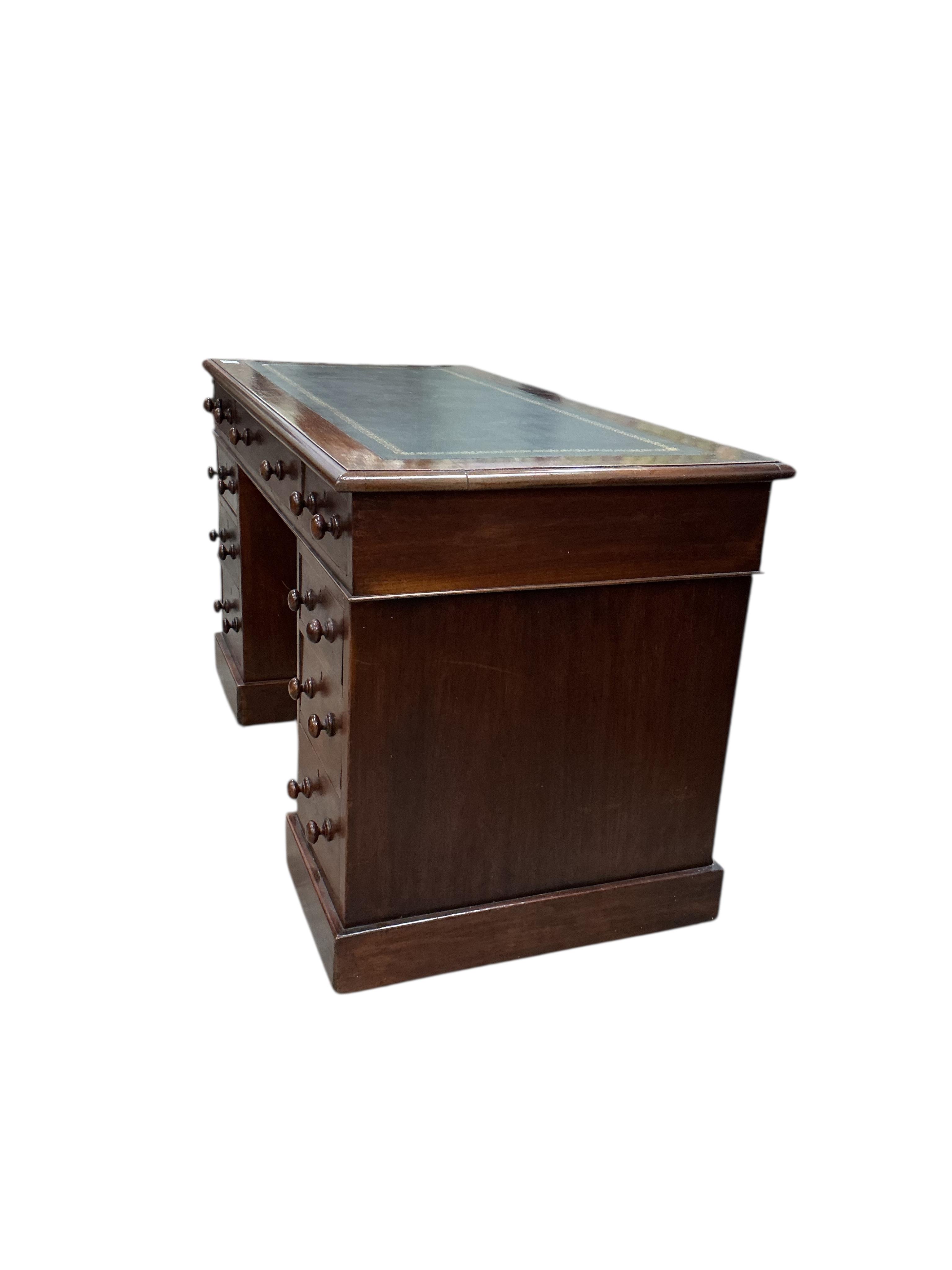 A Victorian mahogany pedestal desk, width 121cm, depth 60cm, height 73cm